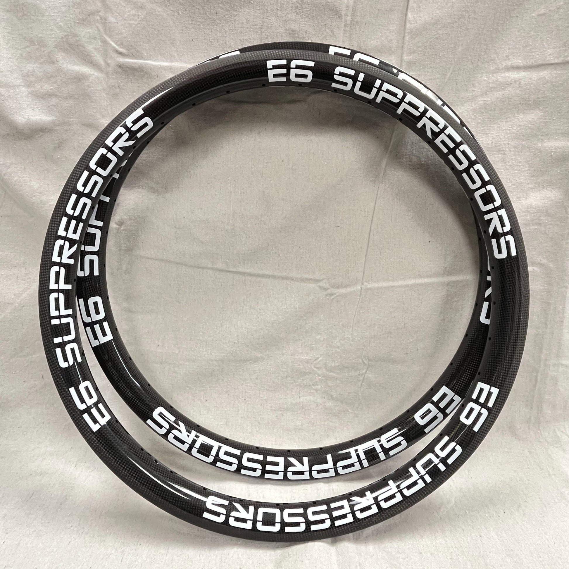 Set of E6 Racing Components Carbon 26" Rim with White Lettering on the side "E6 Suppressors"